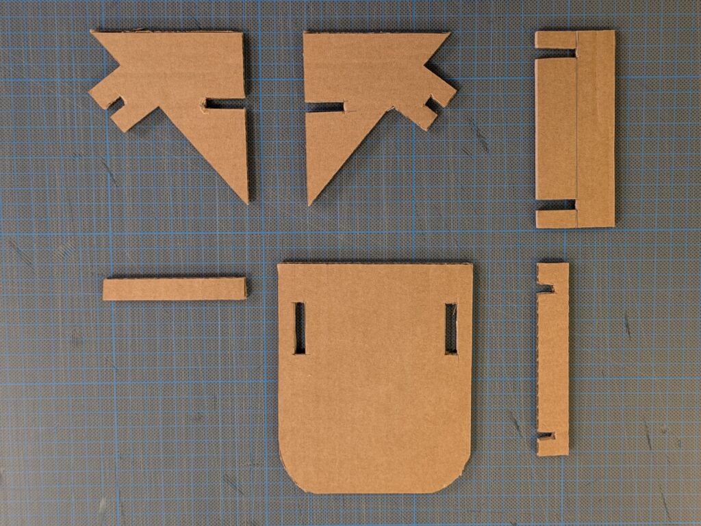 Pièces en carton pour support telephone